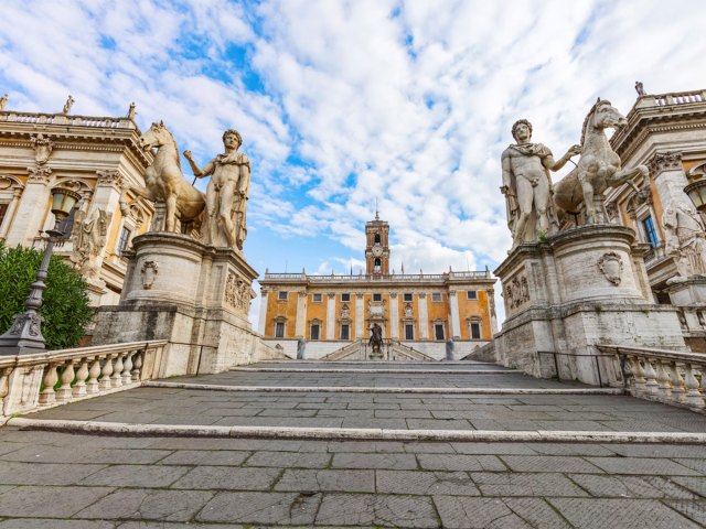 Steps flanked by statues leading to the Capitoline Museums in Rome, Italy