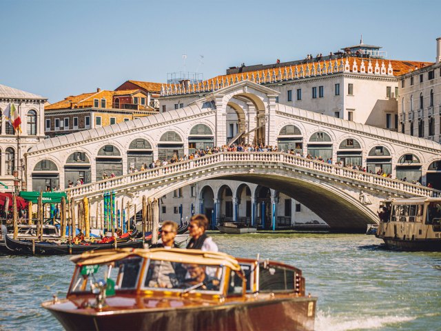 Water taxi in a canal in Venice, Italy