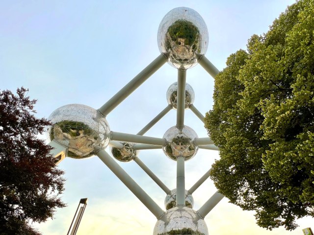 View of atom-shaped structures of the Atomium in Brussels, Belgium, from street level