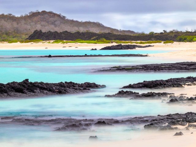 Waves crashing off the coast of the Galápagos Islands