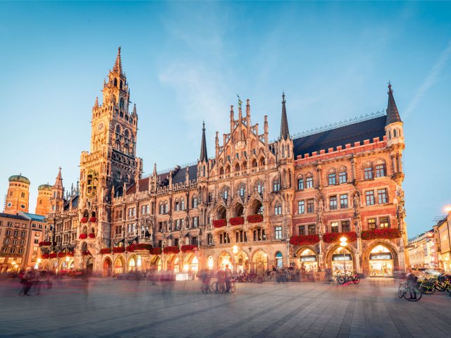 Grand buildings of Marienplatz in Munich, Germany, lit at night