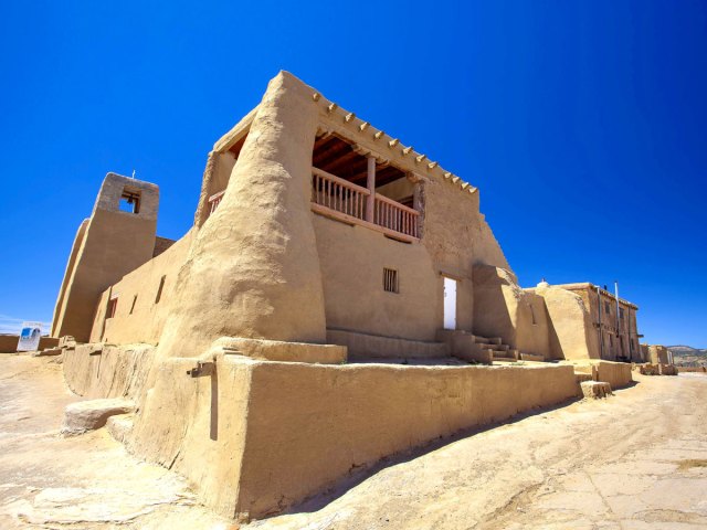 Adobe facade of the San Estevan del Rey Mission Church in New Mexico