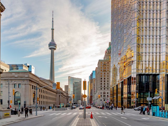 Streets of downtown Toronto with CN Tower in distance