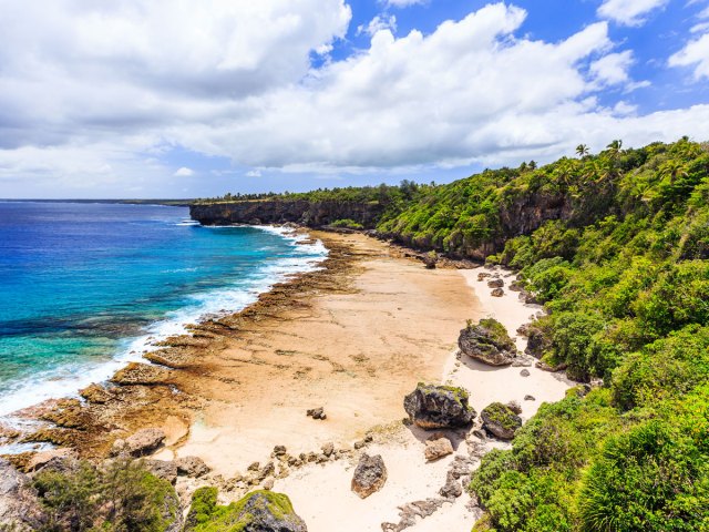 Aerial view of lush Tonga coastline