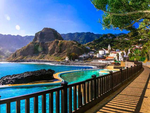 Coastal path leading to mountains on Madeira Island