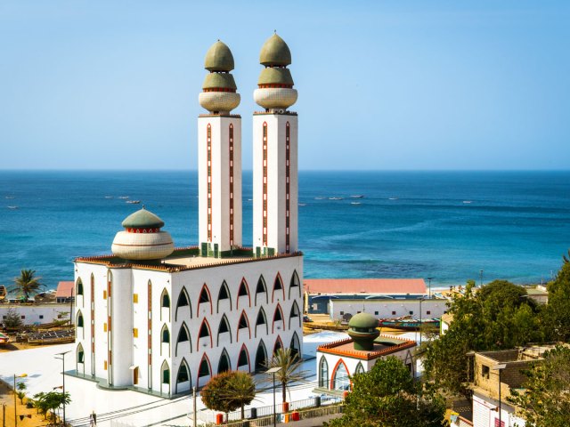 Aerial view of mosque along coastline in Senegal