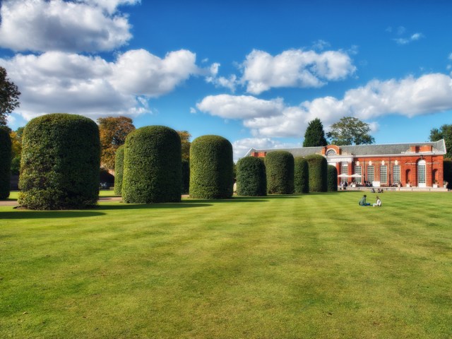 Manicured lawn and hedges at Hyde Park in London, England