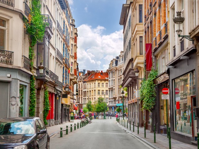 Street lined with apartment buildings in Brussels, Belgium