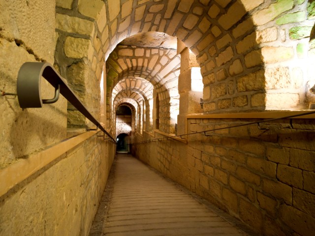 Staircase descending into the Catacombs of Paris, France