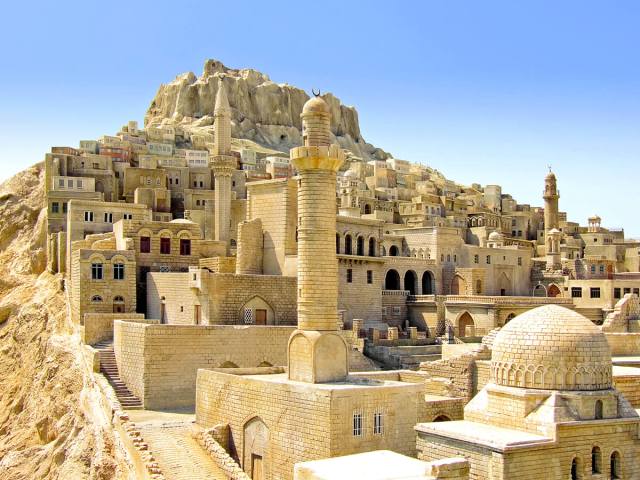 Image of buildings carved out of hillside in Turkey