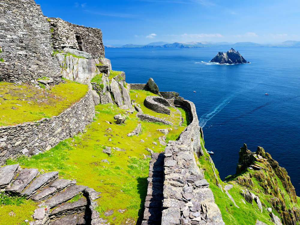 Stone ruins on steep cliffside of Skellig Michael, Ireland