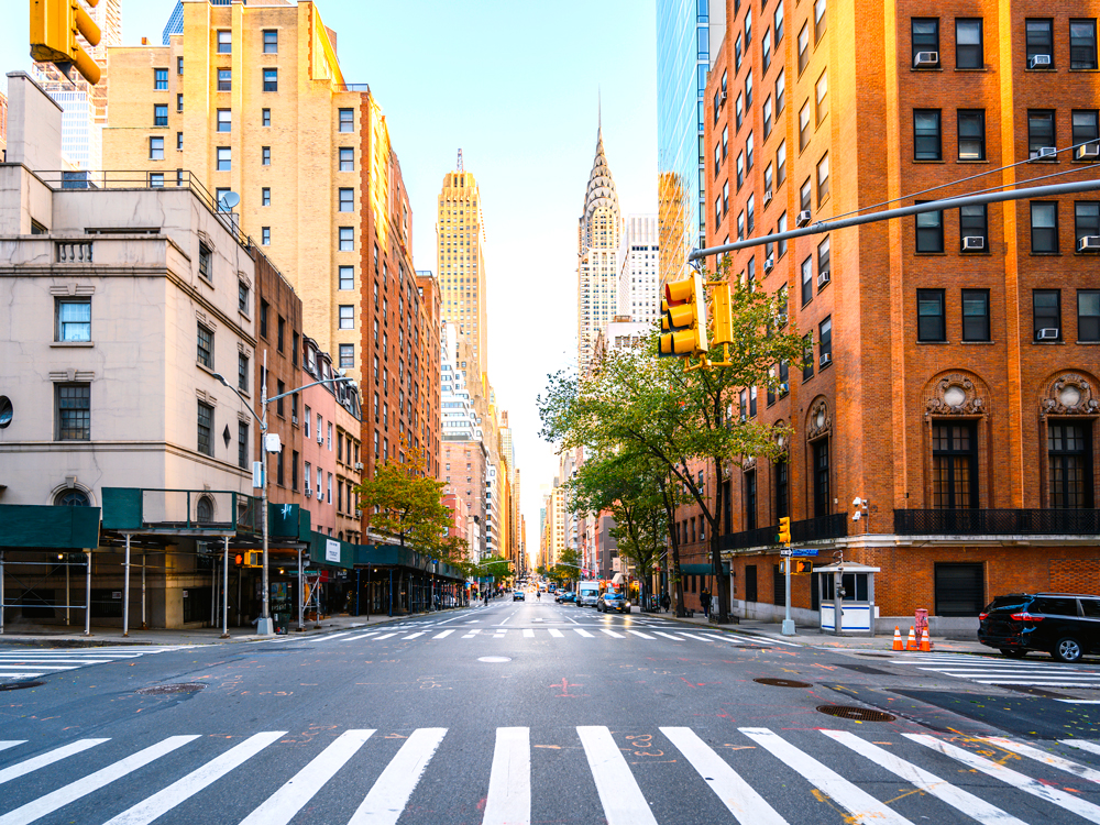 Empty street in midtown Manhattan, New York City, with view of Chrysler Building