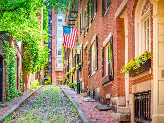 Colonial-style brick row houses on Acorn Street in Boston, Massachusetts