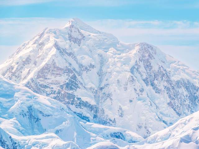 Snowy peak of Mount Hunter in Alaska