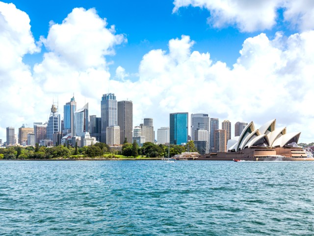 Skyline of Sydney, Australia, with Sydney Opera House, seen from across harbor