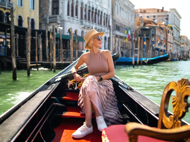 Person on a gondola cruise in Venice, Italy