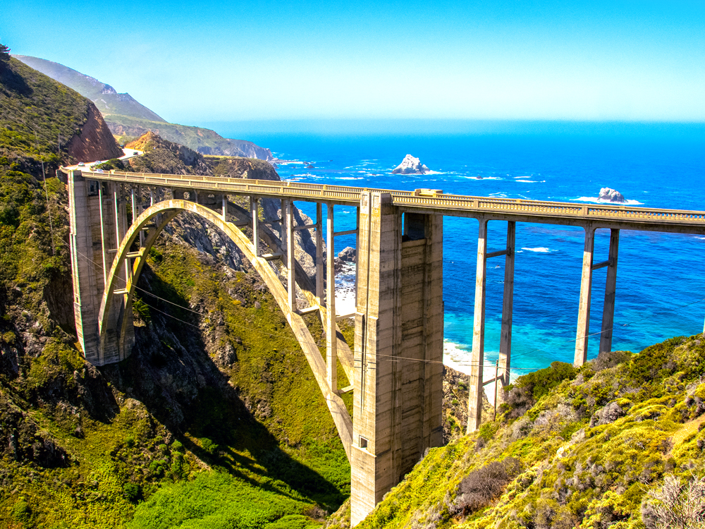 Bixby Bridge over canyon along coast of Big Sur, seen from above