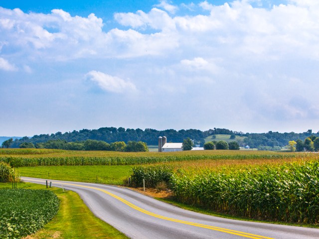 Empty road through farmland in Lancaster, Pennsylvania 