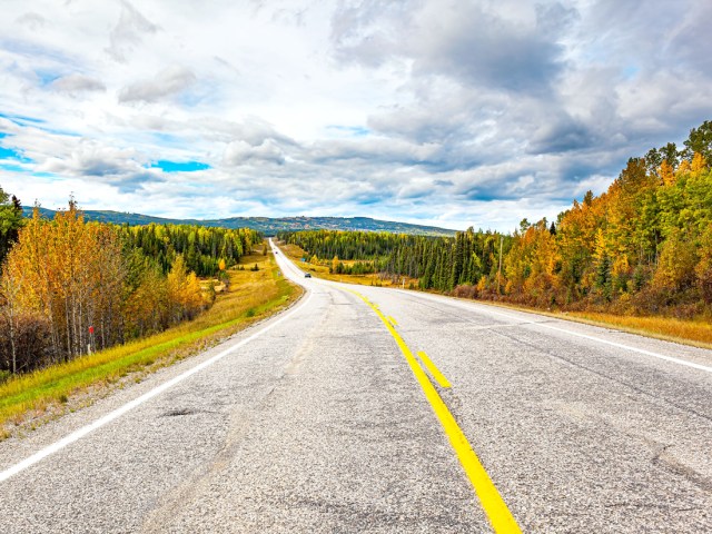 Empty stretch of Pan-American Highway through fall foliage