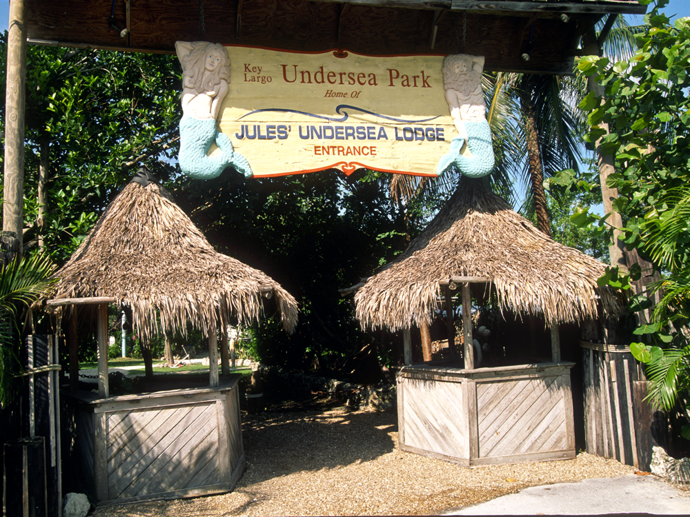 Beach huts at entrance to Jules Undersea Lodge in Key Largo, Florida