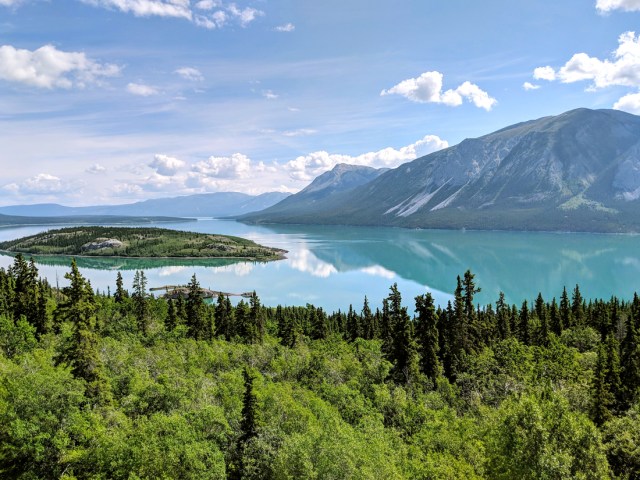 Forest, lake, and mountains near Whitehorse, capital of Canada's Yukon Territory