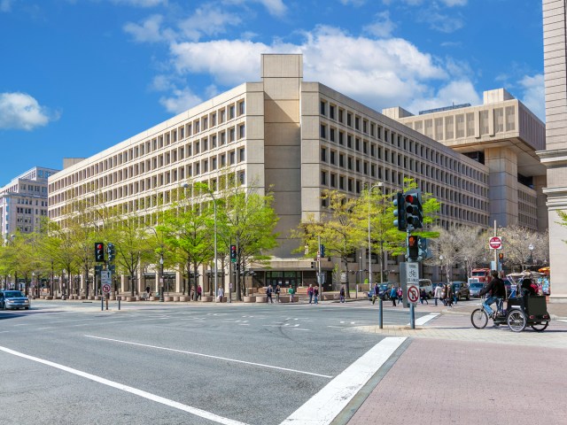 View of J. Edgar Hoover Building in Washington, D.C. across intersection