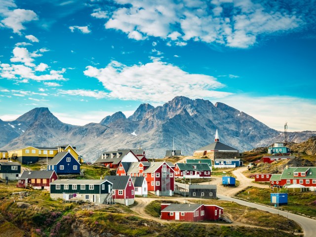 Homes with mountain backdrop on the island of Greenland