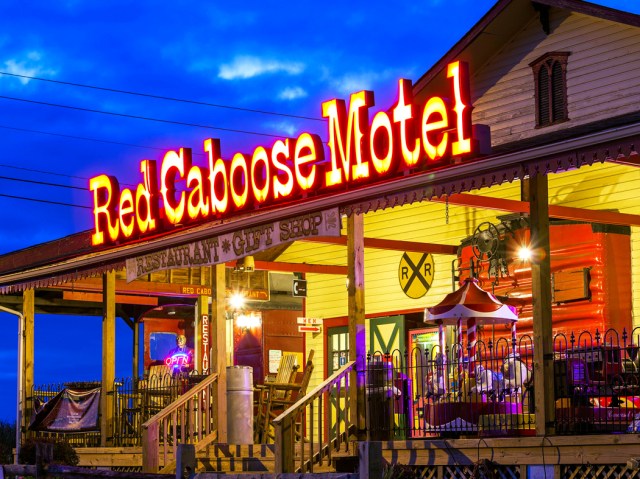 Exterior sign lit at night at Red Caboose Motel in Ronks, Pennsylvania