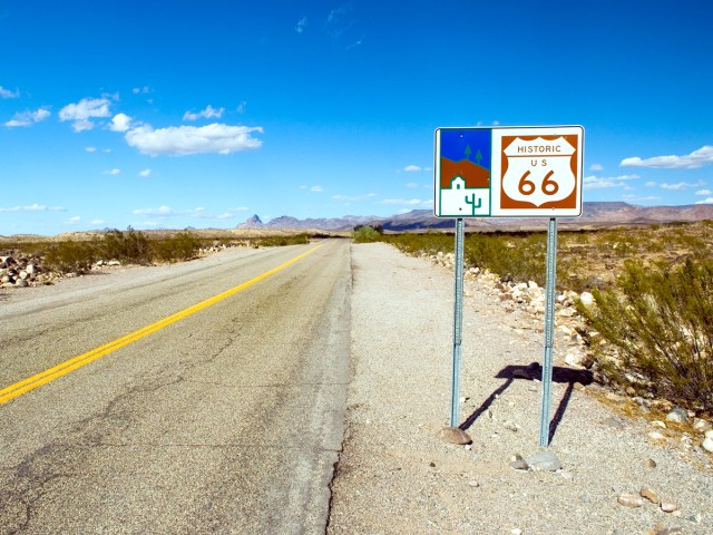 Route marker for Historic U.S. 66 in Arizona desert