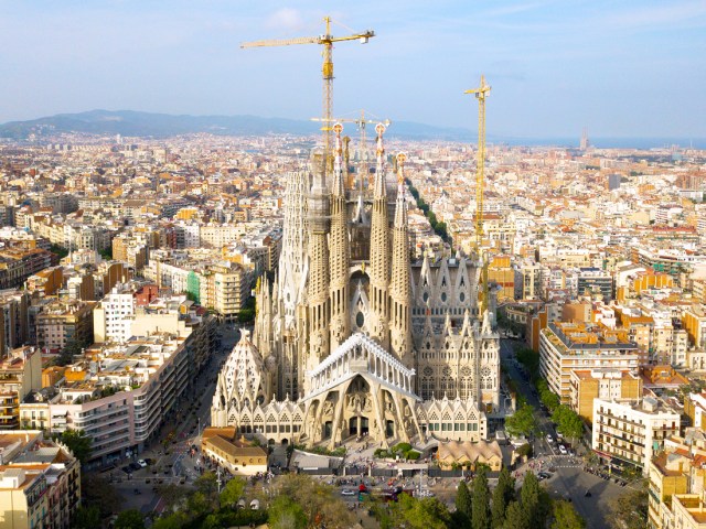 Aerial view of Barcelona, Spain, cityscape, dominated by La Sagrada Familía under construction