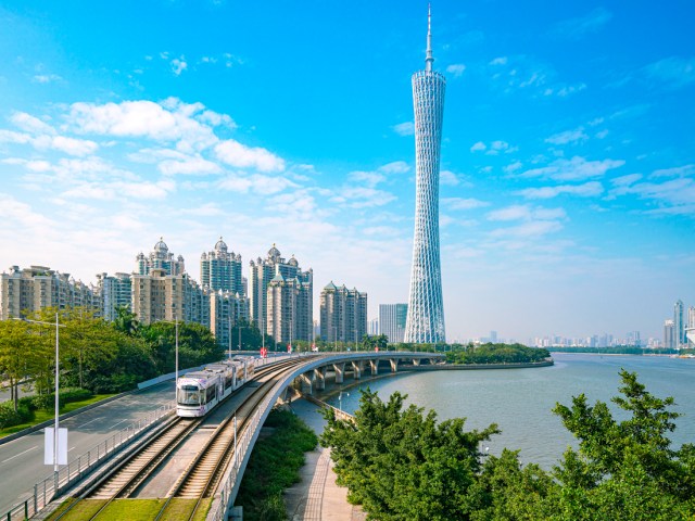 Train tracks leading toward Canton Tower in Guangzhou, China