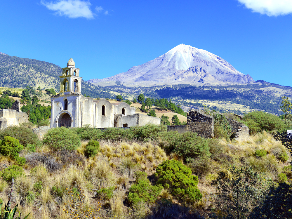 Church ruins with Mexico's Pico de Orizaba in background