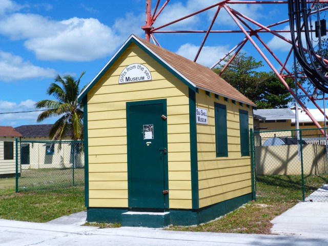 Tiny yellow building housing the Sea Shell Museum in the Bahamas