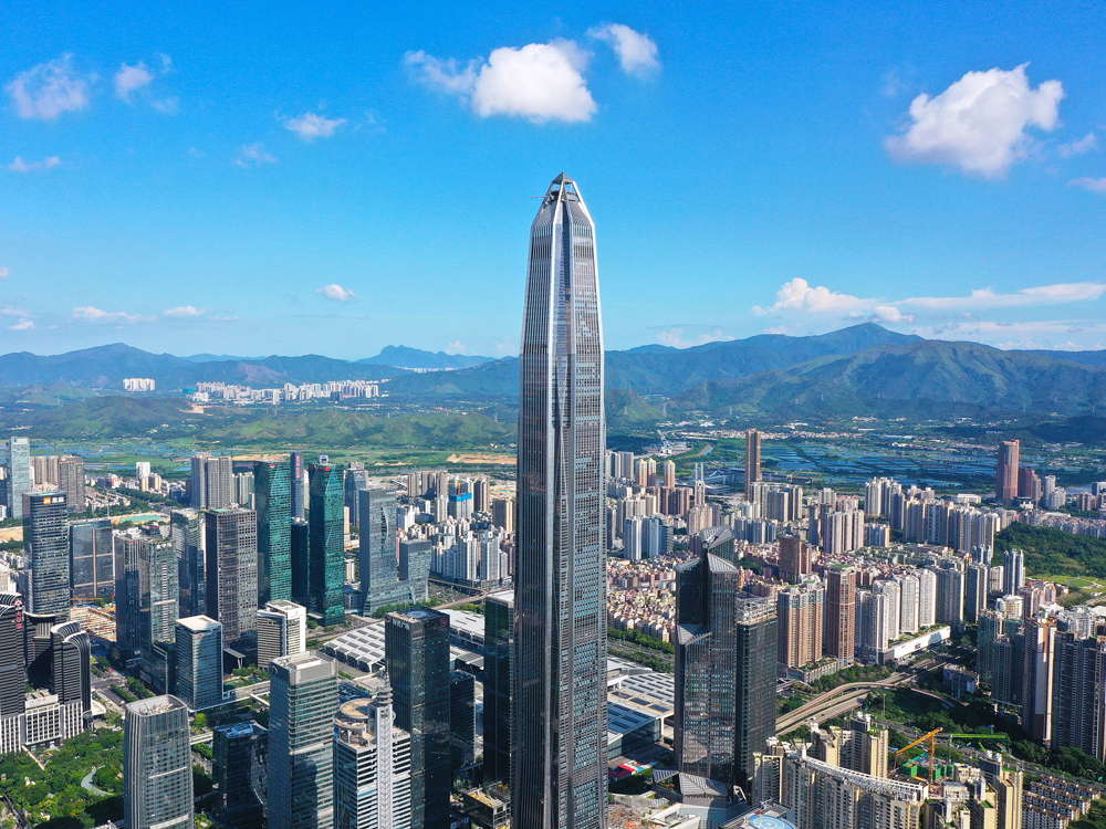 Aerial view of Ping An Finance Center surrounded by Shenzhen skyline