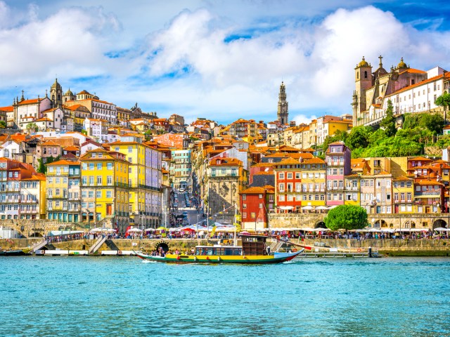 Colorful hillside buildings along waterfront of Porto, Portugal