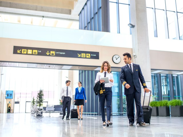 Pilots walking through airport