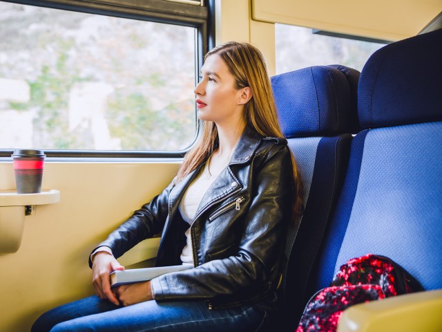 Train passenger looking out window