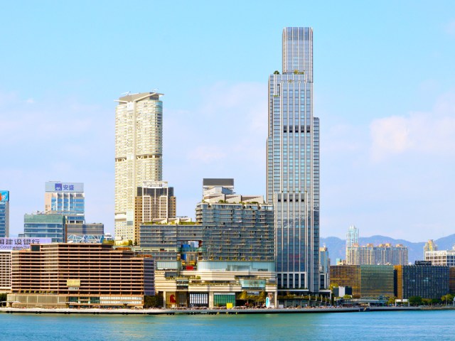 Rosewood Hong Kong and other skyscrapers, seen from across harbor in Hong Kong