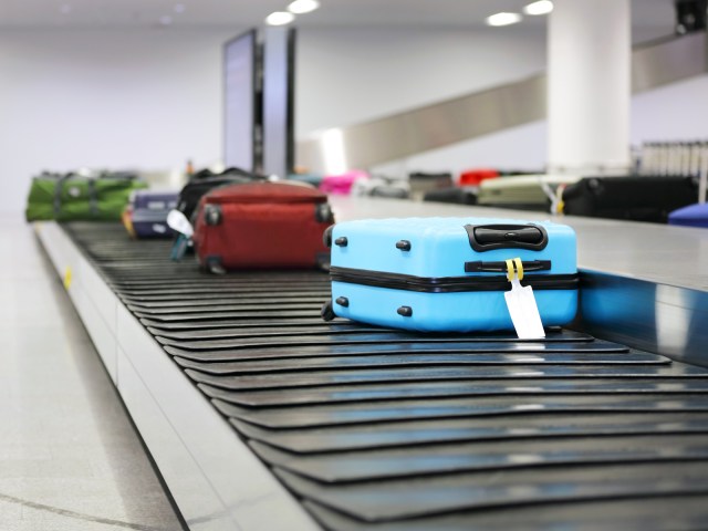 Baggage on airport baggage claim carousel