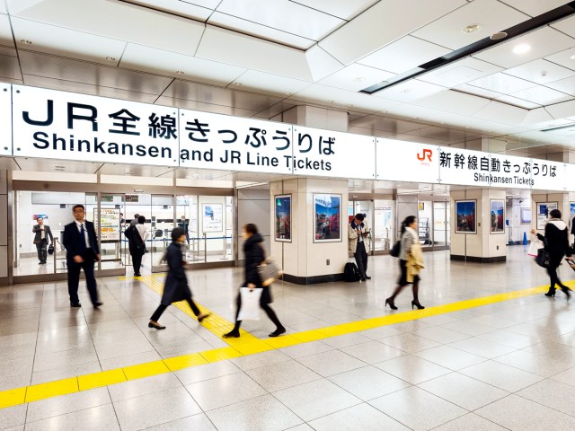 Passengers at Shinkansen ticket lobby in Japan