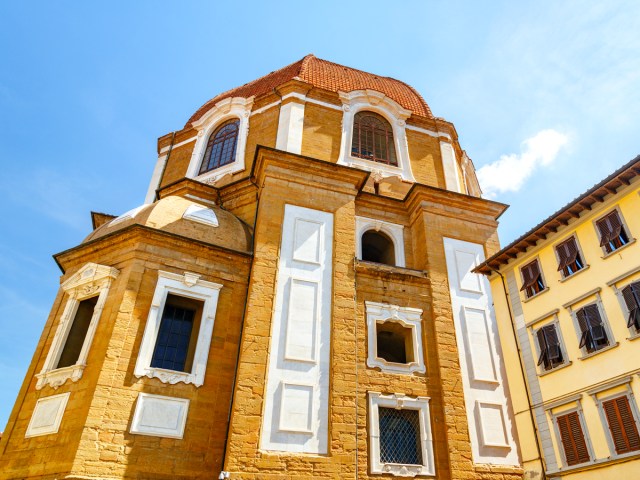 Yellow exterior of Basilica of San Lorenzo in Florence, Italy