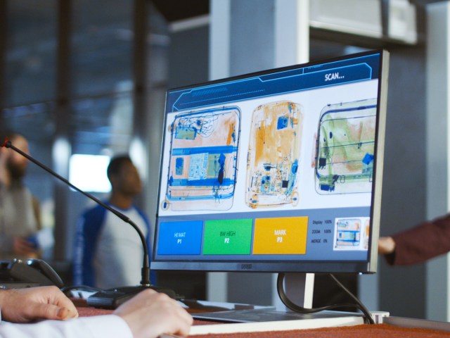 Computer screen showing scans of passenger bags at TSA airport security