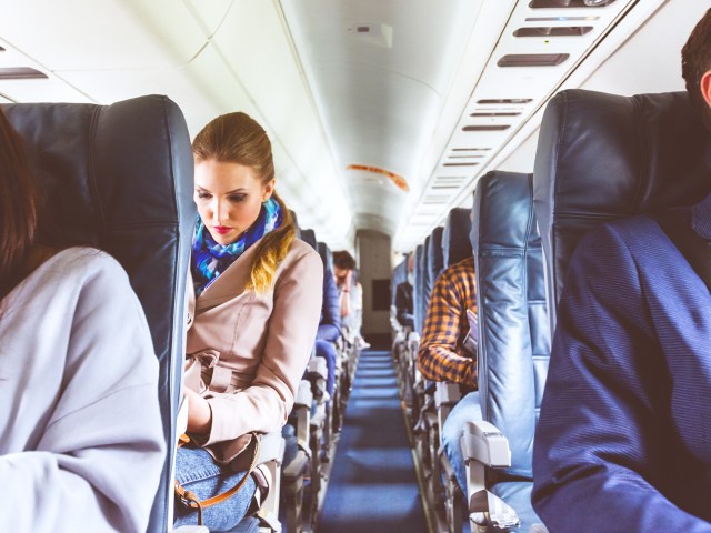 Passengers seated on single-aisle aircraft