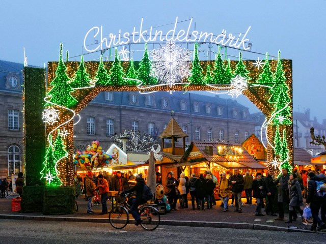 Sign decorated with holiday lights for Christkindelsmärik in Strasbourg, France