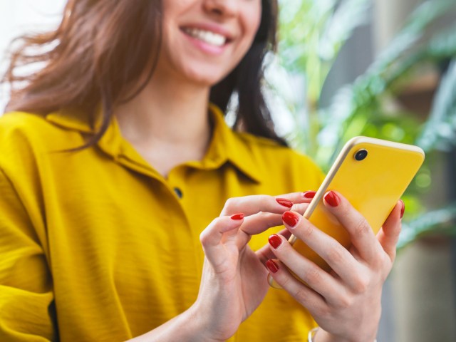 Woman browsing smartphone