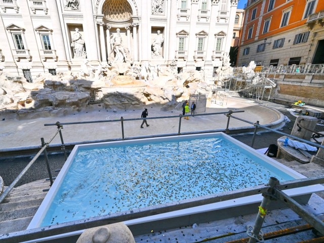 Makeshift pool to collect coins in front of the Trevi Fountain