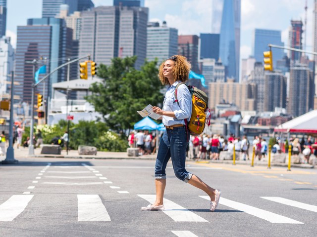 Tourist crossing street in New York City