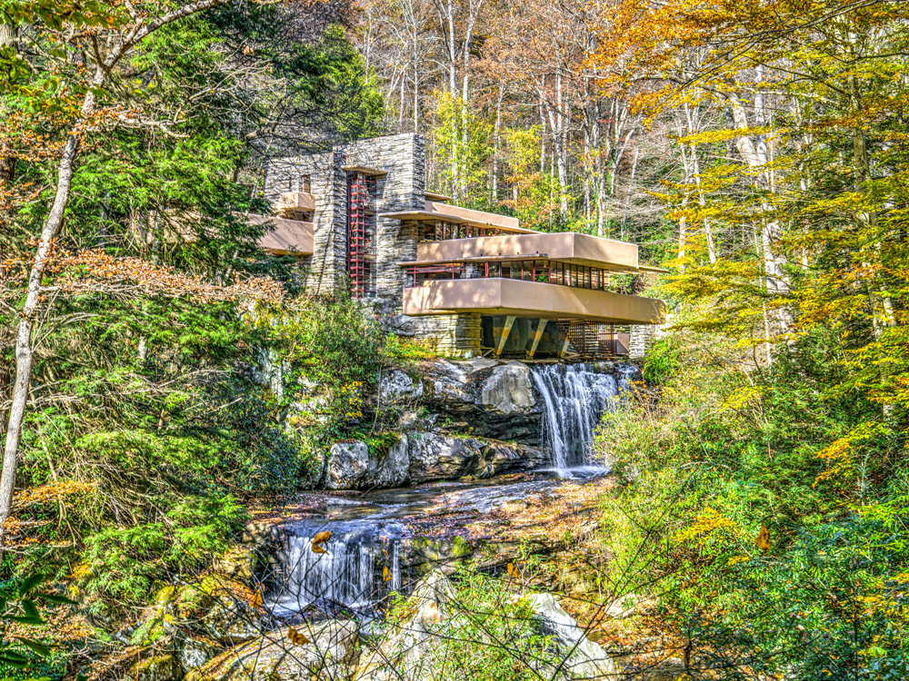 Frank Lloyd Wright's Fallingwater, surrounded by Pennsylvania forest and waterfalls