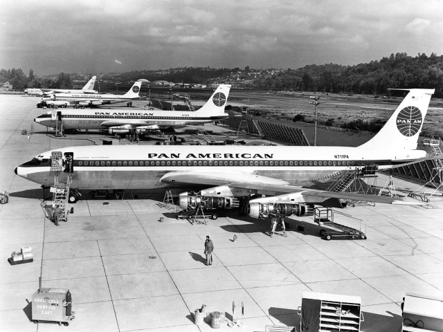 Historical image of Pan Am Boeing 707s parked on ramp