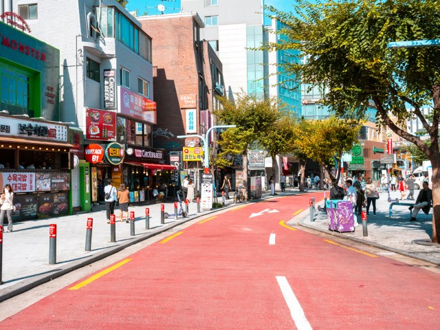 Pedestrians along empty street in Seoul, South Korea